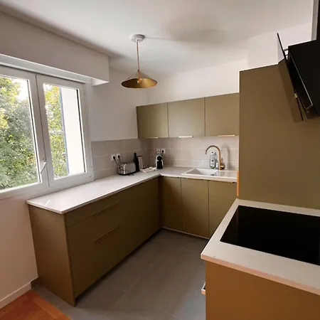 Apartment With Balconies Close To The